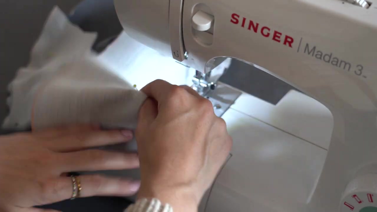 Sewing the waistcoat seams on a sewing machine