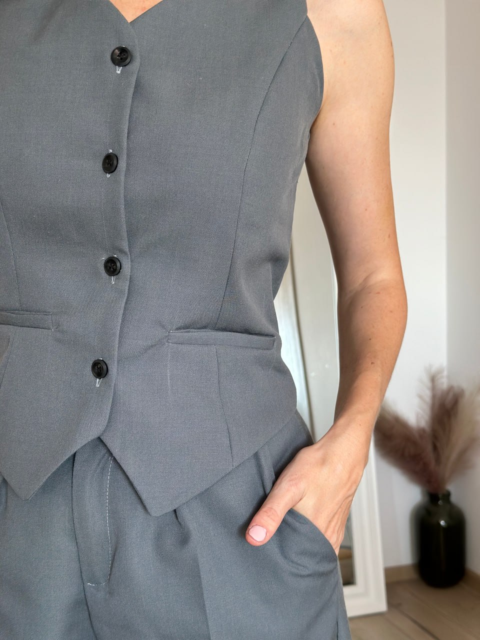 Close-up of the waistcoat button placket and front edge